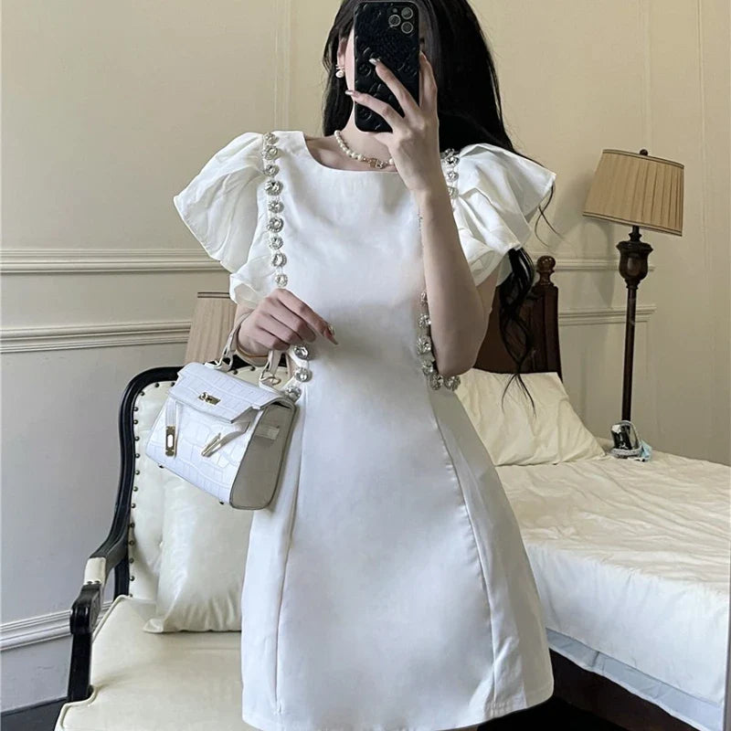 WARMMETA Woman Dress Flying Sleeve Rhinestone Hollow Out O Neck Elegant Spring New Slim White Sexy Dresses Female Mini Fashion