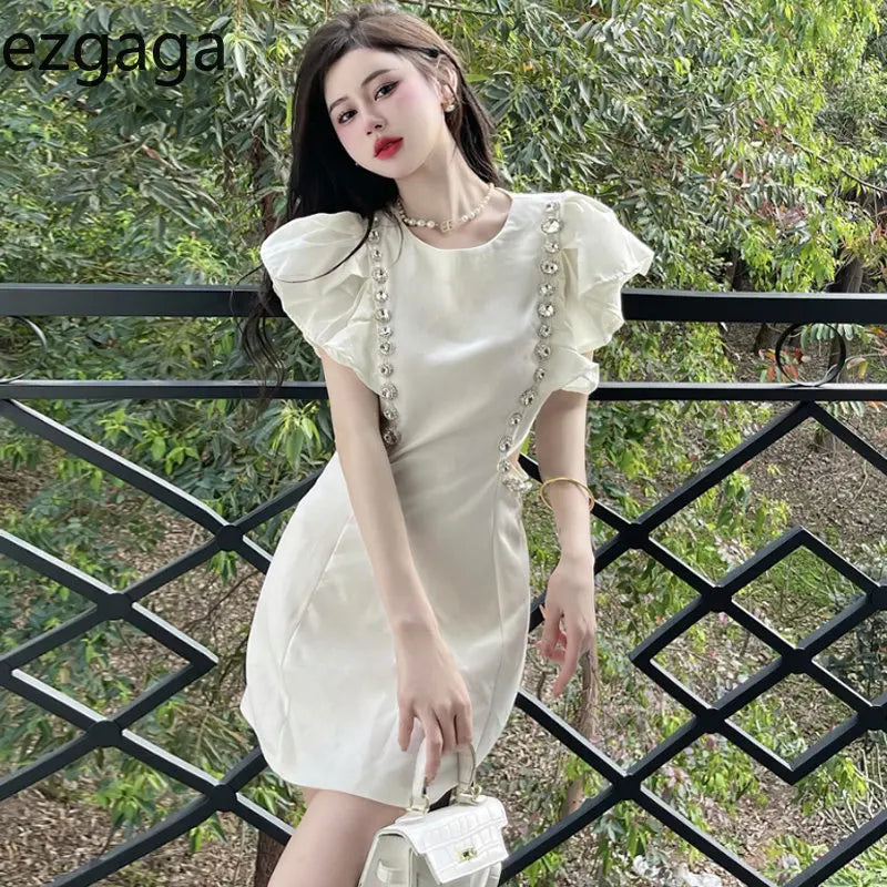 WARMMETA Woman Dress Flying Sleeve Rhinestone Hollow Out O Neck Elegant Spring New Slim White Sexy Dresses Female Mini Fashion