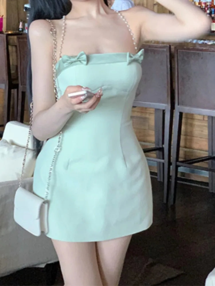 WARMMETA Mini Dresses Women Sleeveless Bowknot Chain Backless Spring Summer Slim French Style Elegant Dress Sweet Sexy Ladies